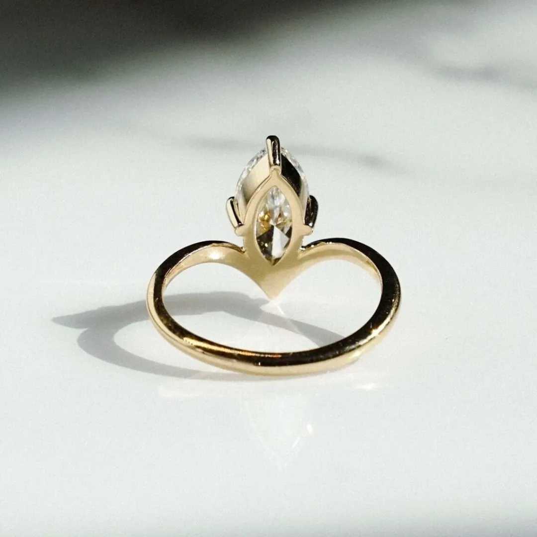 /public/photos/live/Solitaire Marquise Moissanite V Curve Wishbone Ring 616 (1).webp